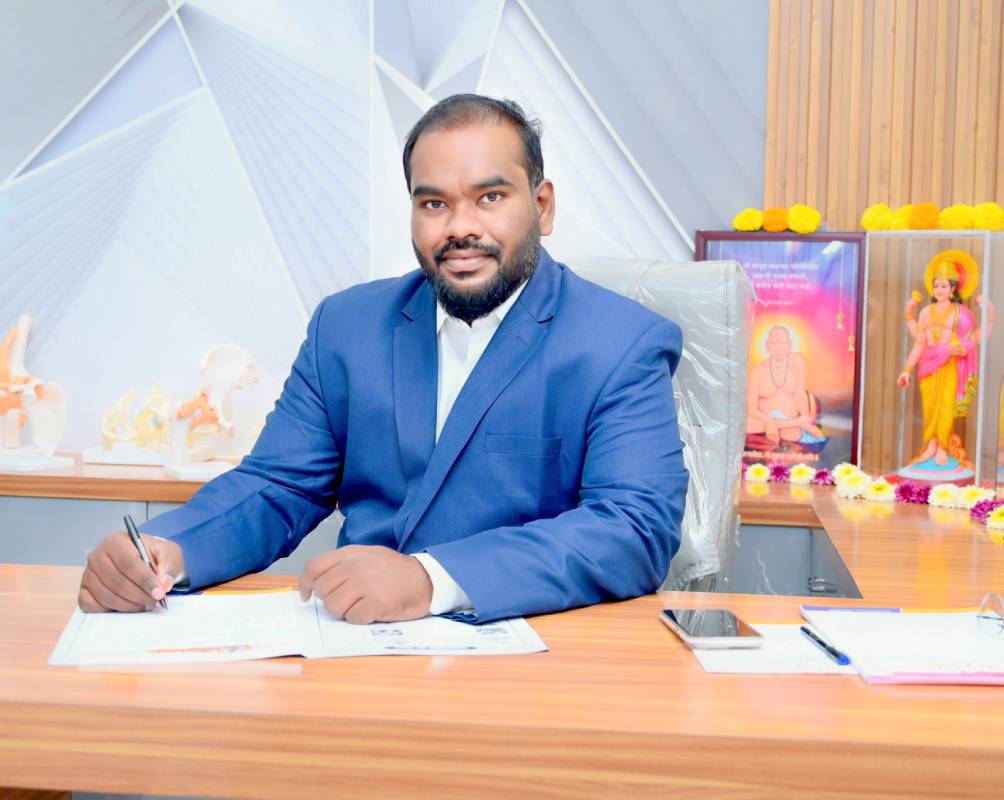 Dr. Ashutosh Jadhav – Best Orthopedic Surgeon in PCMC Pune at his clinic desk