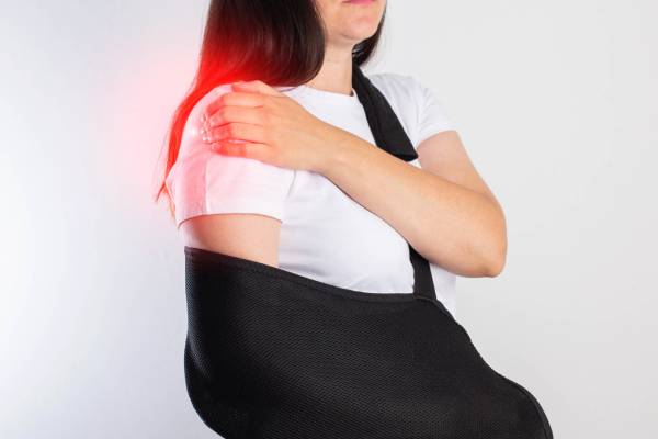 Patient with shoulder sling after shoulder dislocation — Shoulder Dislocation Treatment in PCMC by Dr. Ashutosh Jadhav